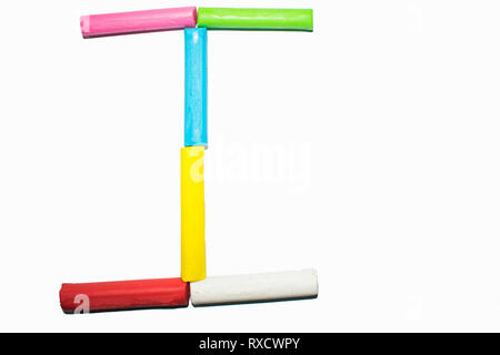 Capital letter I - Alphabet letter J on a white background, colorful clay sticks Stock Photo