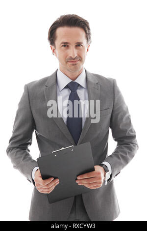 Portrait of young business man holding folder with documents isolated on white Stock Photo