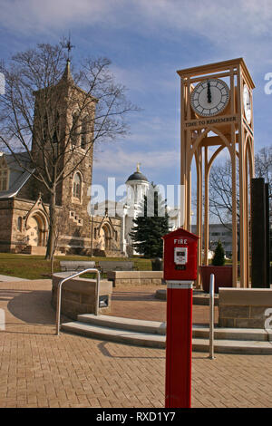 9/11 Memorial clock in downtown Somerville, New Jersey, USA. First Reformed Dutch Church and Somerset County Courthouse in the back. Stock Photo