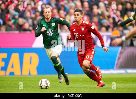 Munich, Germany. 09th Mar, 2019. James RODRIGUEZ, FCB 11 compete for the ball, tackling, duel, header, action, fight against Maximilian ARNOLD, WOB 27 FC BAYERN MUNICH - VFL WOLFSBURG 6-0 - DFL REGULATIONS PROHIBIT ANY USE OF PHOTOGRAPHS as IMAGE SEQUENCES and/or QUASI-VIDEO - 1.German Soccer League, Munich, March 09, 2019 Season 2018/2019, matchday 25, FCB, München, Credit: Peter Schatz/Alamy Live News Stock Photo