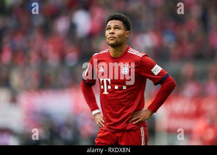 Munich, Germany. 09th Mar, 2019. Serge GNABRY, FCB 22 half-size, portrait, sad, disappointed, angry, Emotions, disappointment, frustration, frustrated, sadness, desperate, despair, FC BAYERN MUNICH - VFL WOLFSBURG 6-0 - DFL REGULATIONS PROHIBIT ANY USE OF PHOTOGRAPHS as IMAGE SEQUENCES and/or QUASI-VIDEO - 1.German Soccer League, Munich, March 09, 2019 Season 2018/2019, matchday 25, FCB, München, Credit: Peter Schatz/Alamy Live News Stock Photo