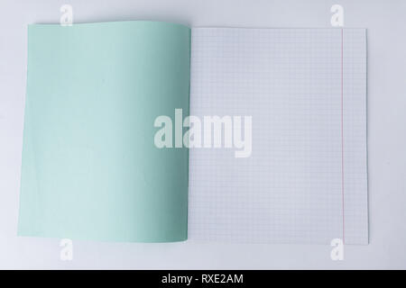 close up.open school notebook in a cage.photo with copy space Stock Photo
