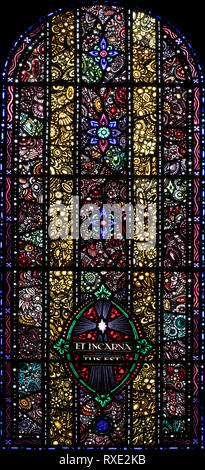 Jewel-like window symbolising the Incarnation, St. Oswald & St. Edmund Church, Ashton-in-Makerfield, Greater Manchester, UK Stock Photo