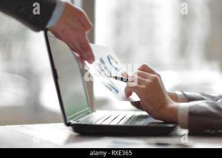 close up.colleagues are discussing financial data. development concept. Stock Photo