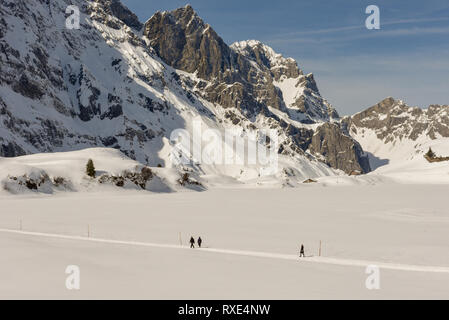 Engelberg, Switzerland - 3 March 2019: People walking at Trubsee over Engelberg on the Swiss alps Stock Photo