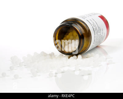 Homeopathy Pills on white Background Stock Photo
