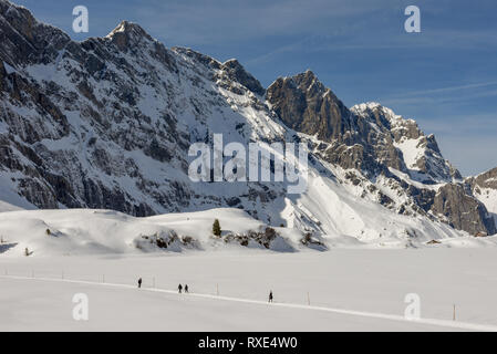 Engelberg, Switzerland - 3 March 2019: People walking at Trubsee over Engelberg on the Swiss alps Stock Photo