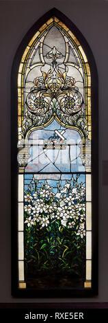 Lilies (Corey Memorial Window). Tiffany Glass and Decorating Company; American, 1892-1902; Corona, New York. Date: 1892-1895. Dimensions: 414 × 82.6 cm (163 × 32 1/2 in.). Leaded Favrile glass. Origin: . Museum: The Chicago Art Institute. Author: LOUIS COMFORT TIFFANY. Stock Photo