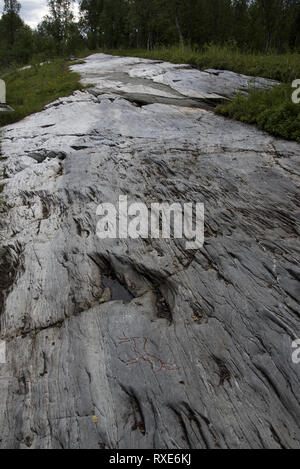 Almost 7000 years ago  stoneage fishermen and Reindeer herders made famous Kirkely rock carvings near Tennes in Balsfjord in Northern Norway. Stock Photo