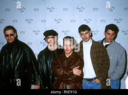 LOS ANGELES, CA - FEBRUARY 7: (L-R) Singers Donnie Wahlberg, Danny Wood, Joey McIntyre, Jordan Knight, and Jonathan Knight of New Kids on the Block attend the 21st Annual American Music Awards on February 7, 1994 at Shrine Auditorium in Los Angeles, California. Photo by Barry King/Alamy Stock Photo Stock Photo
