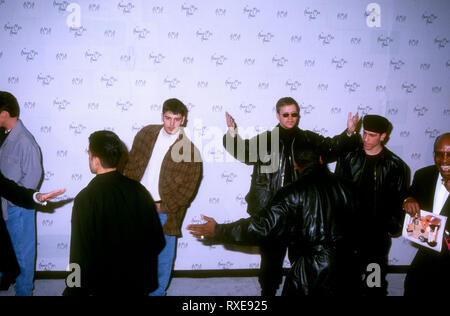LOS ANGELES, CA - FEBRUARY 7: (L-R) Singers Jordan Knight, Donnie Wahlberg and Danny Wood of New Kids on the Block attend the 21st Annual American Music Awards on February 7, 1994 at Shrine Auditorium in Los Angeles, California. Photo by Barry King/Alamy Stock Photo Stock Photo