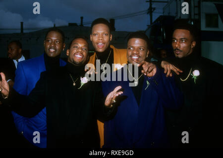 LOS ANGELES, CA - FEBRUARY 7: (L-R) Singers Johnny Gill, Michael Blvins, Ronnie DeVoe, Ricky Bell and Ralph Tresvant of New Edition attend the 21st Annual American Music Awards on February 7, 1994 at Shrine Auditorium in Los Angeles, California. Photo by Barry King/Alamy Stock Photo Stock Photo