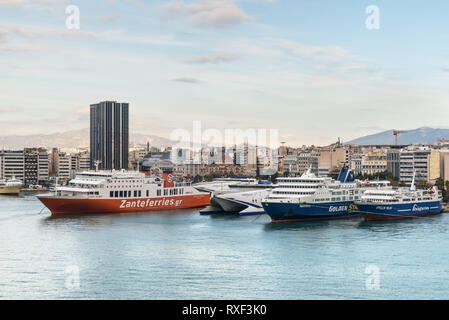 Piraeus, Greece - November 1, 2017: Passenger ferrys docked at the port of Piraeus, Greece, is the largest Greek seaport. Concept of transportation an Stock Photo