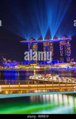 SINGAPORE CITY, SINGAPORE - MARCH 3, 2019: Spectra Light and Water Show Marina Bay Sand Casino Hotel Downtown Singapore Stock Photo