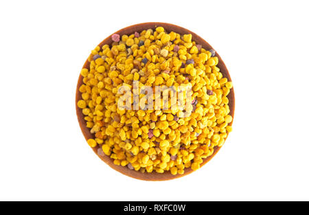 A Bowl of Pellets of Yellow Bee Pollen Stock Photo