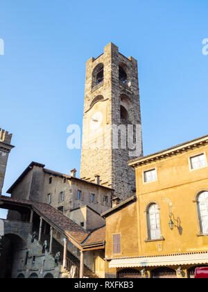 Travel to Italy - palace Palazzo del Podesta and Campanone (Torre civica) bell tower on Piazza Vecchia square in Citta Alta (Upper Town) of Bergamo ci Stock Photo