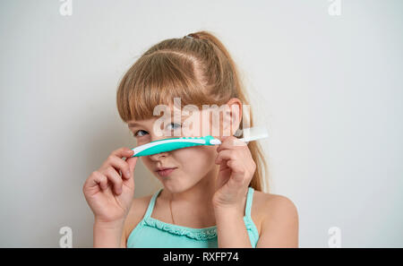 child brushes his teeth Stock Photo