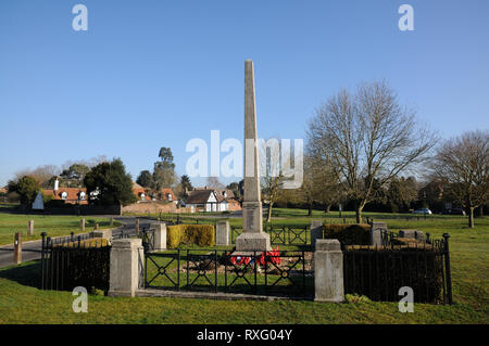 War Memorial, Redbourn, Hertfordshire. It is a memorial to those who fell serving their country during both World Wars standing on the Common Stock Photo