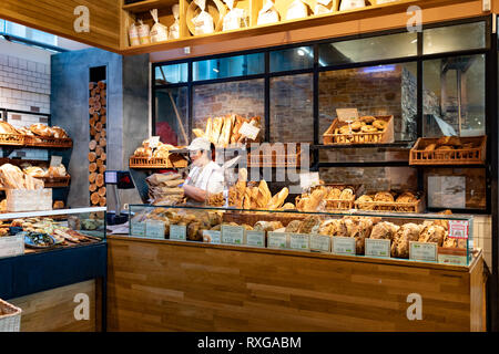 ROME, ITALY - FEBRUARY 17, 2019: The Eataly bakery in Rome at at Ostiense station, selling a big variety of high quality breads. Stock Photo