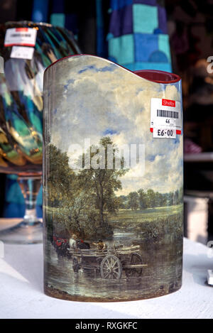 A vase featuring The Hay Wain by John Constable in the window of a Shelter charity shop in Edinburgh, Scotland, UK. Stock Photo