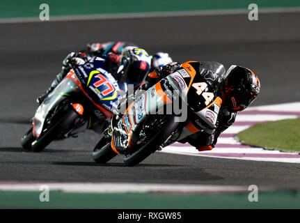 Doha, Qatar. 9th Mar, 2019. Spanish Moto3 rider Aron Canet (R) of Max Racing Team competes during the Moto3 qualifying 2 session of 2019 MotoGP Grand Prix of Qatar in Losail Circuit of Doha, capital of Qatar, on March 9, 2019. Credit: Nikku/Xinhua/Alamy Live News Stock Photo