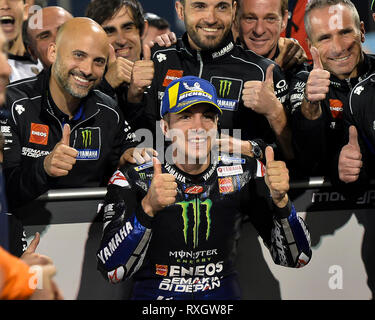 Doha, Qatar. 9th Mar, 2019. Spanish MotoGP rider Maverick Vinales (C) of Monster Energy Yamaha MotoGP celebrates the pole position with the team after the MotoGP qualifying session of 2019 MotoGP Grand Prix of Qatar in Losail Circuit of Doha, capital of Qatar, on March 9, 2019. Credit: Nikku/Xinhua/Alamy Live News Stock Photo