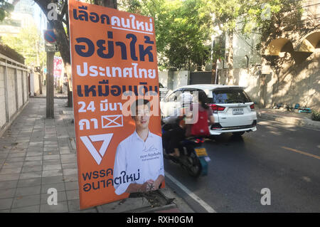 Bangkok, Thailand. 10th Mar, 2019. An election poster of the opposition party 'Future Forward' with the portrait of the top candidate Thanathorn Juangroongruangkit hangs in a street. About five years after the latest military coup, a new parliament is to be elected in Thailand on 24 March 2019. Credit: Christoph Sator/dpa/Alamy Live News Stock Photo