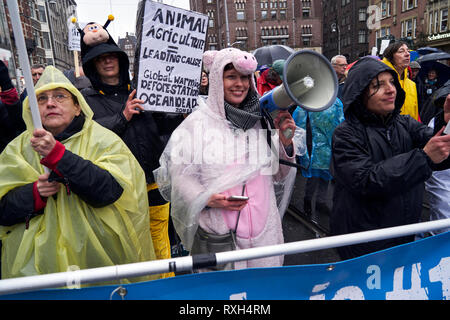 Animal rights groups take part in the march. Summoned by civil associations and NGOs, thousands of people demonstrated today in Amsterdam to demand that governments act decisively in the face of the increasingly imminent danger posed by climate change. Stock Photo