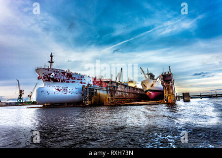 Two large ships in dry repair dock Stock Photo