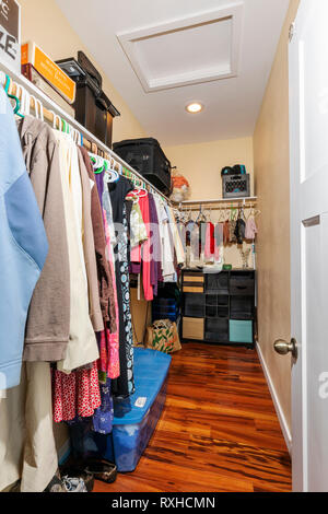 Interior view of townhouse clothing closet; Poncha Springs; Colorado; USA Stock Photo