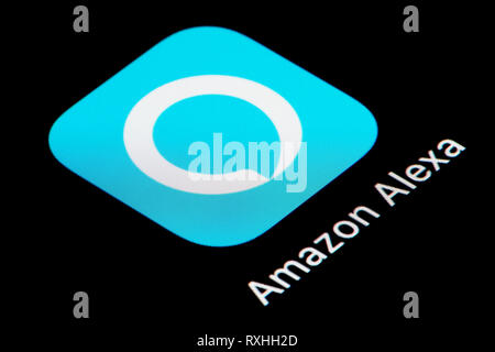 A close-up shot of the Amazon Alexa app icon, as seen on the screen of a smart phone (Editorial use only) Stock Photo