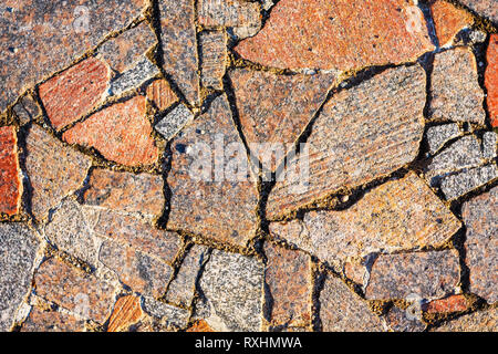 Ragged Broken Pavement Granite Covering. Architectural Texture Finish Coating Stock Photo