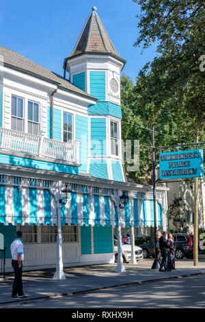 Outside view of Commander's Palace Restaurant building, famous Creole cuisine restaurant, New Orleans Garden District, New Orleans, Louisiana, LA, USA Stock Photo