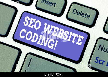 Text sign showing Seo Website Coding. Conceptual photo create site in way make it more visible to search engine Keyboard key Intention to create compu Stock Photo