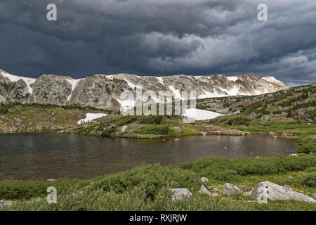 A storm brews over Medicine Bow Peak in the Snowy Range of Wyoming Stock Photo