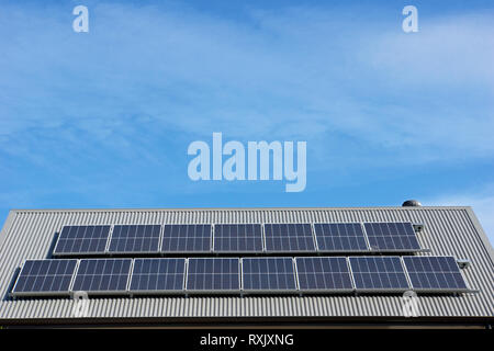 Photovoltaic cell, solar panel roof display, an alternative energy, sustainable resource, in Victoria, Australia. Stock Photo