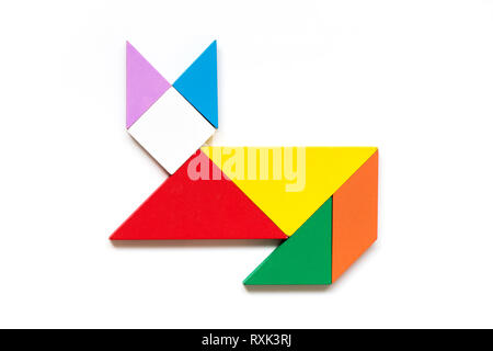 Color wood tangram puzzle in cat shape on white background Stock Photo