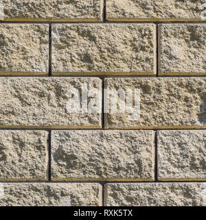 Background from the wall of white brick. yellow beige brick. Brick texture. Seamless design vintage style yellow beige cream tone brick wall detailed  Stock Photo