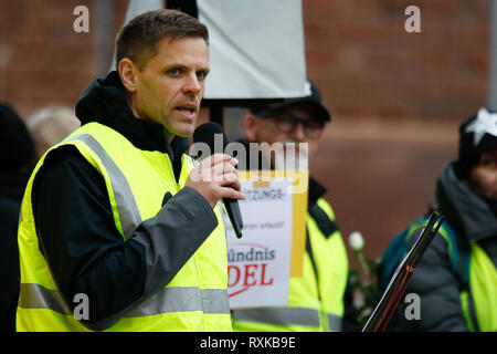 Landau, Germany. 9th March 2019. The organiser of the right-wing protest Marco Kurz addresses the opening rally. Around 80 people from right-wing organisations protested in the city of Landau in Palatinate against the German government and migrants. They also adopted the yellow vests from the French yellow vest protest movement (Photo by Michae Credit: PACIFIC PRESS/Alamy Live News Stock Photo