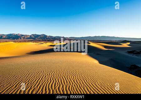 Morning hike in the Mesquite Flat Sand Dunes Stock Photo