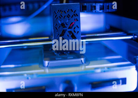 Process of printing plastic model on automatic 3d printer machine Stock Photo