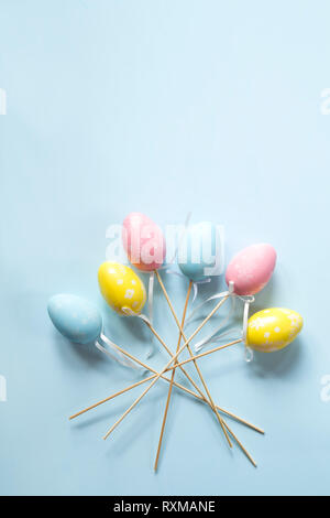 Colorful Easter eggs on blue background Stock Photo