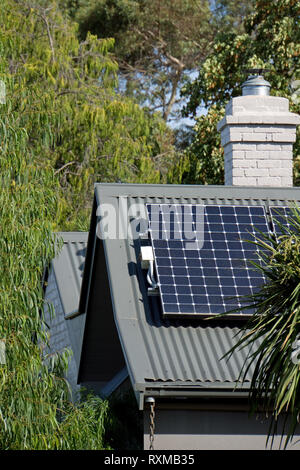 Photovoltaic cell, solar panel roof display, an alternative energy, sustainable resource, in Victoria, Australia. Stock Photo