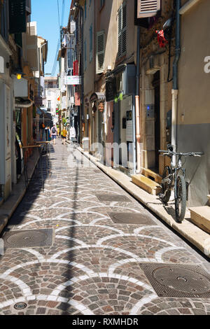 Antibes, France, September 11, 2018: Impression of the narrow streets in the old center of Antibes Stock Photo