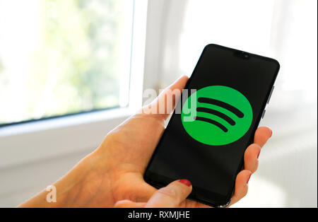 Spotify music app symbol hand smartphone Stock Photo