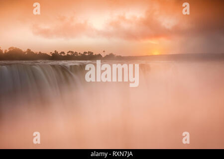 Beautiful sunrise over Victoria Falls, Zimbabwe Stock Photo