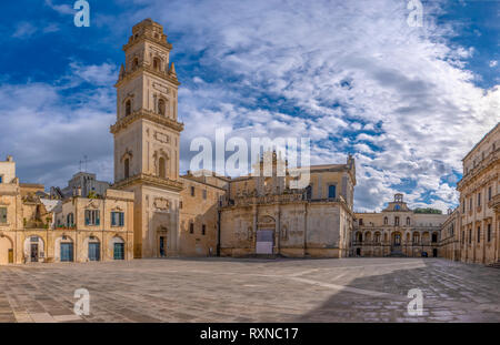 Panorama of Piazza del Duomo square , Campanile tower and Virgin Mary Cathedral ( Basilica di Santa Maria Assunta in Cielo ) in Lecce - Puglia, Italy.