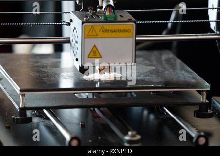 3d printer in action while printing Stock Photo