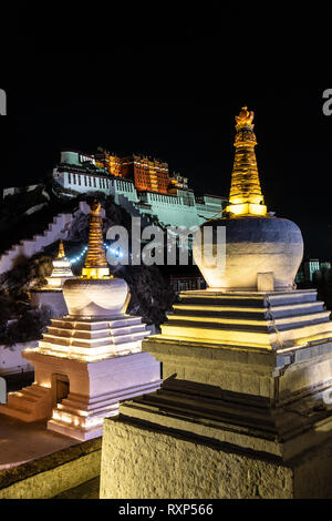Night view of the illuminated Potala palace in Lhasa old town in Tibet, China Stock Photo