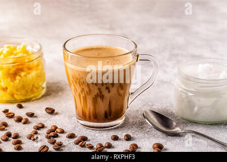 Coffee blended with ghee butter and MCT coconut oil, paleo, keto, ketogenic drink breakfast. Stock Photo